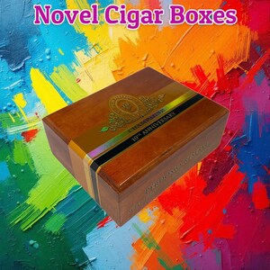 May include: A rectangular wooden cigar box with a glossy finish. The box features a gold-colored band with the text "CHAMPAGNE 10TH ANNIVERSARY". The box is set against a colorful, abstract background. The text "Novel Cigar Boxes" is at the top.