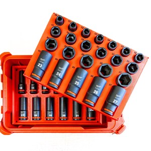 May include: An orange tool case with a set of black impact sockets. The sockets are arranged on an orange holder, with sizes ranging from 10 to 27. The case is open, revealing the organized tools.