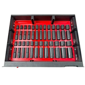 May include: A collection of black impact sockets and extensions neatly organized in a red tray. The sockets are labelled with imperial measurements, from 5/16 to 1 inch. The black tray is designed for tool chest storage.