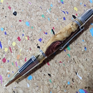 Maple Burl Wooden Pen Hybrid with Mixed Red Resin and Glitter and a Titanium Chrome and Gold Art Deco Pen Kit