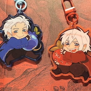 May include: A set of three ceramic mugs with a speckled, matte finish. The mugs are in shades of cream, light gray, and dark gray. Each mug has a simple, minimalist design, perfect for coffee or tea.