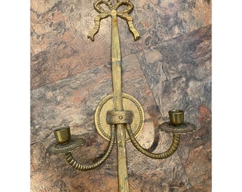 Vintage brass bow wall candle stick holder