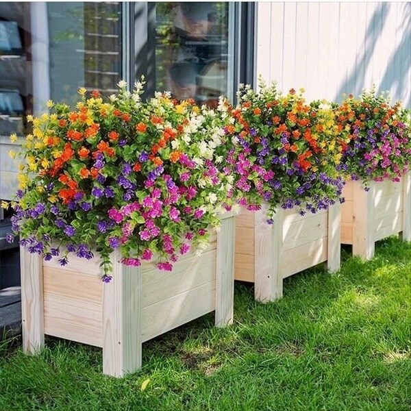 Outside artificial flowers, colorful