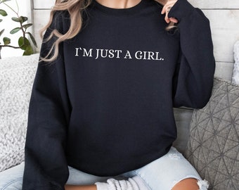 I'm Just a Girl" statement sweatshirt