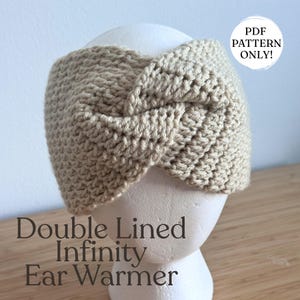 May include: A beige, double-lined infinity ear warmer, crocheted with a textured stitch. The ear warmer is displayed on a white mannequin head. Text on the image reads "Double Lined Infinity Ear Warmer" and "PDF PATTERN ONLY!"