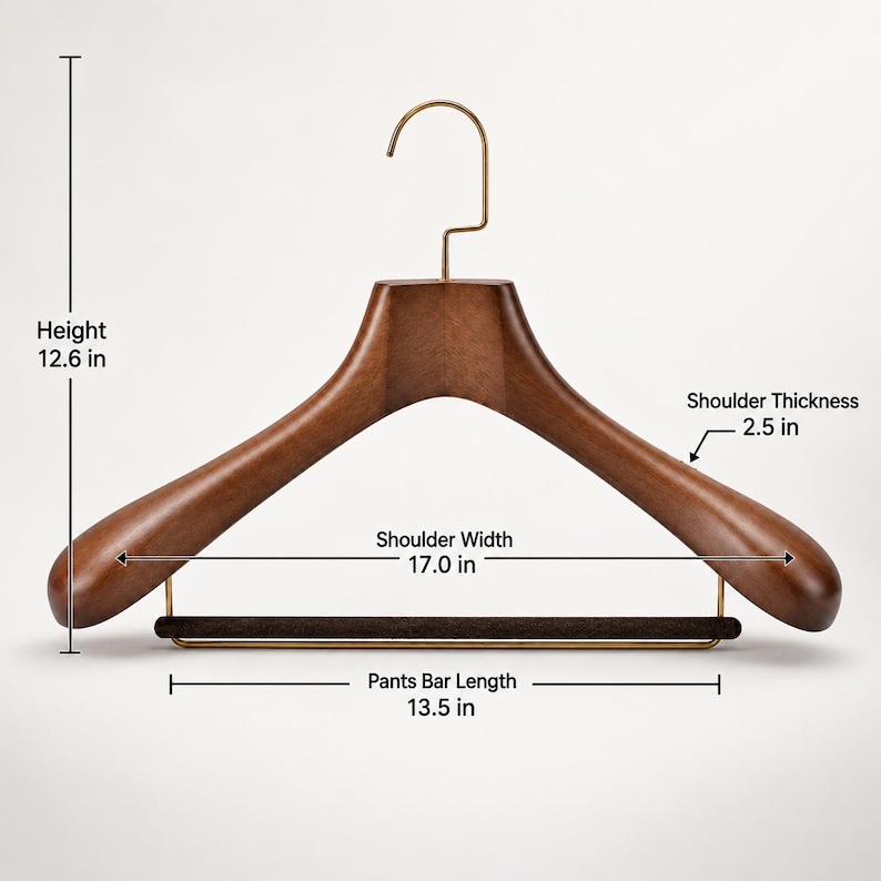 May include: A dark brown wooden clothes hanger with a gold-toned metal hook and a velvet-covered pants bar. Dimensions are 12.6 inches in height, 17.0 inches in shoulder width, 2.5 inches in shoulder thickness, and a 13.5-inch pants bar length.
