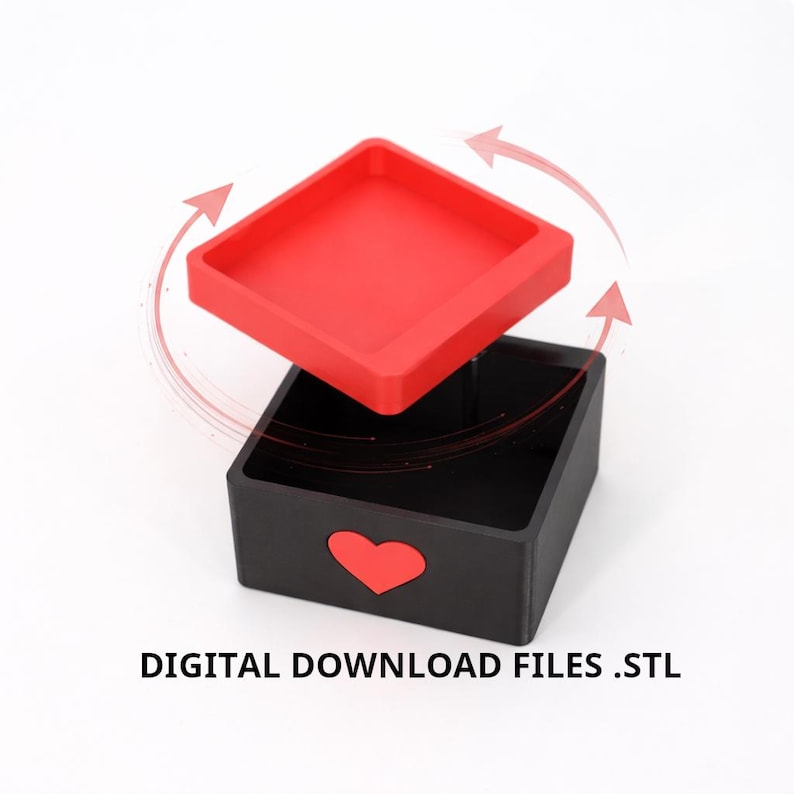 K&ouml;nnte beinhalten: Eine schwarze quadratische Box mit einem roten Herz-Ausschnitt und einem separaten roten quadratischen Deckel. Der Text "DIGITAL DOWNLOAD FILES .STL" befindet sich unten. Der Deckel befindet sich leicht &uuml;ber der Box, mit gebogenen Pfeilen darum.