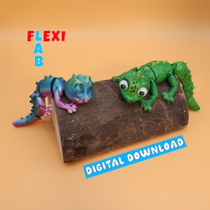 May include: Two articulated toy lizards, one green and one iridescent blue and pink, are posed on a brown log. The green lizard is on the log, while the blue and pink lizard is partially on the log and partially off. The text "DIGITAL DOWNLOAD" is on a blue banner below the log.