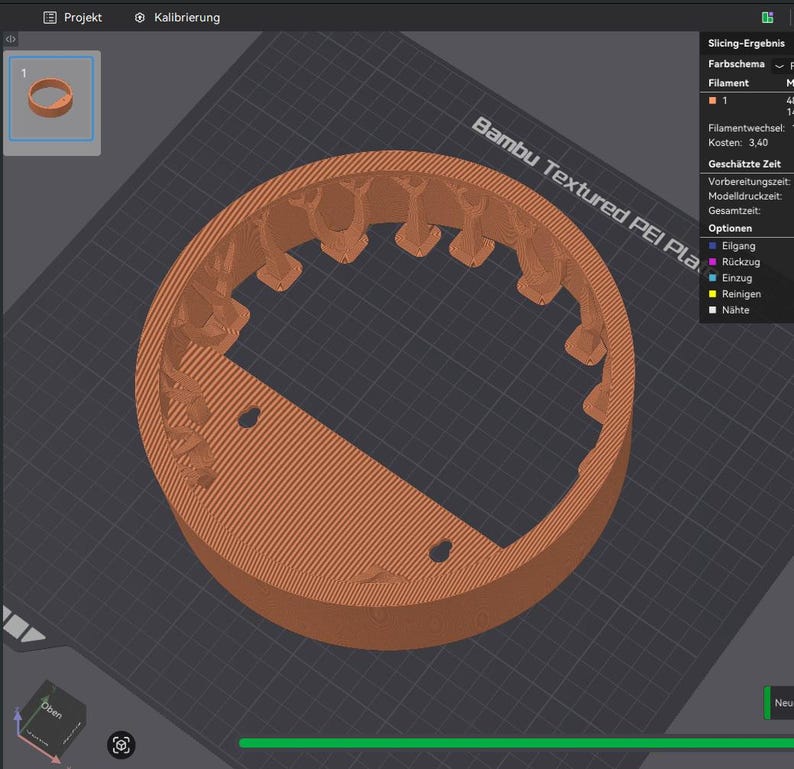 May include: A 3D-printed, orange-brown object with a circular shape and a section cut out. The object has a textured surface and a series of curved, tooth-like structures along the outer edge. Two small holes are visible within the cut-out section.