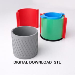 May include: A white ceramic mug with a black handle and the text "But First, Coffee" in a black, handwritten-style font. The mug is on a white surface.