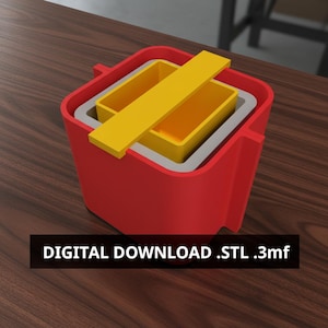 May include: A red, yellow, and gray 3D-printed container with a rectangular shape. The container has a yellow lid and a gray interior. The text "DIGITAL DOWNLOAD .STL .3mf" is displayed on a black bar at the bottom of the image.