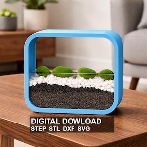 Könnte beinhalten: Ein hellblaues, quadratisches Terrarium mit abgerundeten Ecken. Im Inneren stützen Schichten aus schwarzen und weißen Steinen grüne Moosbälle. Das Terrarium trägt unten den Text "DIGITAL DOWLOAD STEP STL DXF SVG".