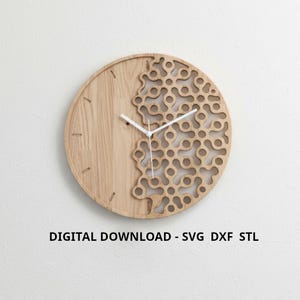 May include: A circular wooden clock with a distinctive design. One half of the clock face is solid wood, the other has a cut-out pattern. The clock has white hands and the text "DIGITAL DOWNLOAD - SVG DXF STL" at the bottom.