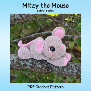 May include: A crocheted mouse toy in shades of gray and pink, resting on a tree branch. The mouse has large, sparkly eyes and the text "Mitzy the Mouse" and "PDF Crochet Pattern" are visible.