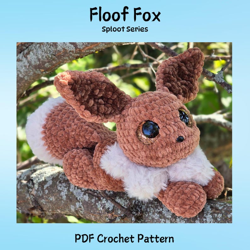 May include: A brown and white crocheted fox plush toy with large ears and sparkling eyes. The plush is lying on a tree branch. The image includes the text "Floof Fox Sploot Series" and "PDF Crochet Pattern".