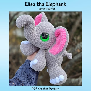 May include: A handmade gray crochet elephant toy with pink inner ears and large green eyes. The elephant has white accents on its feet and trunk. The text "Elise the Elephant" and "Sploot Series" are at the top, and "PDF Crochet Pattern" is at the bottom.