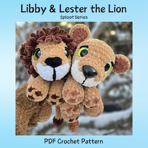 May include: Two plush lion toys, Libby and Lester, are featured in this image. The lions are made of soft, textured yarn in shades of brown and tan, with black noses and green eyes. The text "Libby & Lester the Lion" and "PDF Crochet Pattern" are also visible.