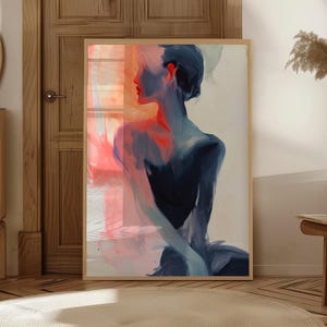 May include: A white ceramic mug with a black handle and the text "But First, Coffee" in a black, bold font. The mug is on a white surface. The mug is approximately 10 cm tall.