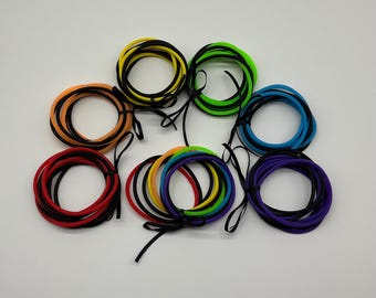 Set of 50 Black and Blue, Green, Orange, Purple, Rainbow, Red and Yellow 80s Jelly Bracelets Wrapped In A Satin Bow