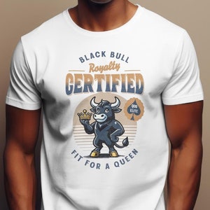May include: White t-shirt with a black bull wearing a crown and holding a playing card. The text on the shirt reads "Black Bull Royalty Certified 008 Elite Fit for a Queen."