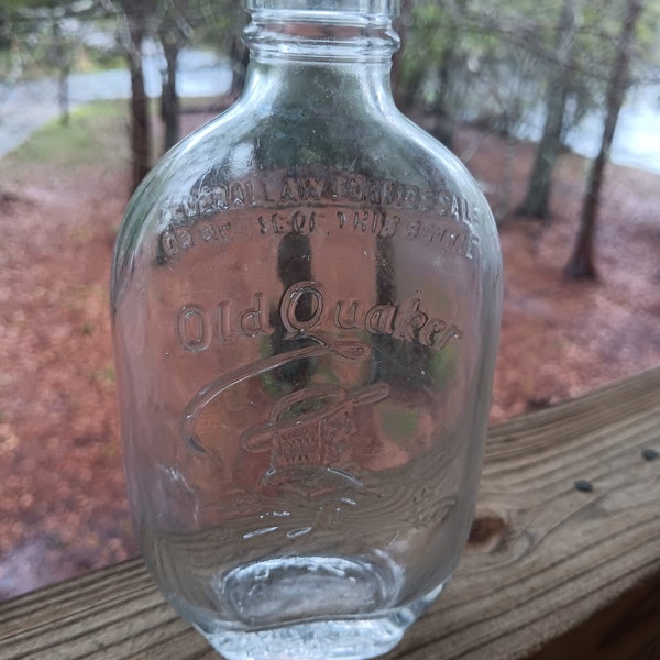 Old Quaker Vintage Embossed One Pint Whiskey Bottle