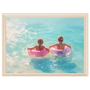 May include: A framed painting depicting two individuals from behind, each floating in the turquoise water within a bright pink inflatable ring. The scene captures the sunlight reflecting off the water's surface, creating a bright and clear aquatic setting.