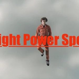 May include: A person wearing an orange jumpsuit and black trainers is suspended in mid-air against a cloudy sky. The text "Flight Power Spell" is displayed in bold red letters across the centre of the image with a red line underneath.