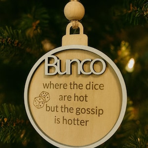 bunco where the dice are hot but the gossip is hotter. perfect gift for your bunco babes. ornament that is laser engraved and double layered