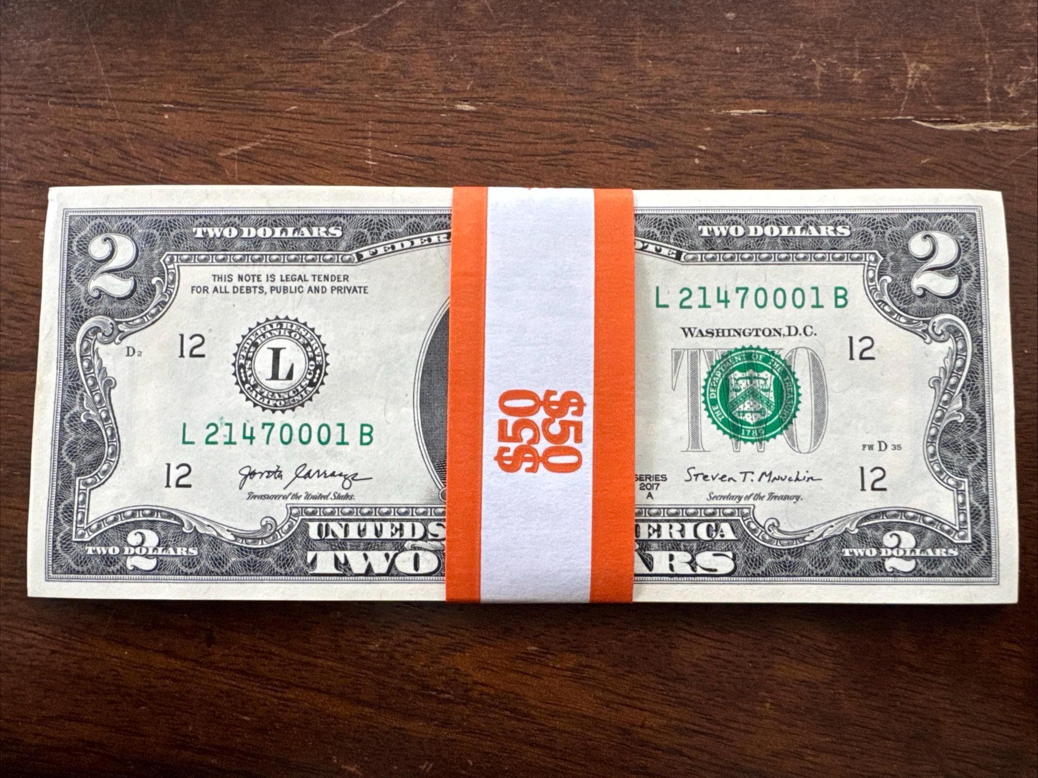 25 Brand new Two Dollar Bills shipped in protective sleeve