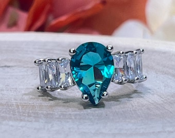 3.0ct Green Pear Cut Ring with 6 Emerald Cut Band made of CZ 5A Highest Quality Cubic Zirconia, For Engagement, Wedding or any occasion