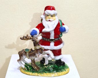Festive Santa with reindeer collectible—hand-painted, vibrant, and full of holiday charm. Perfect Christmas gift, décor piece, or keepsake