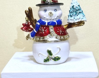 Cute enamel snowman trinket box with sparkling crystals, mini Xmas tree and festive colors. Perfect holiday décor, gift or jewelry keepsake