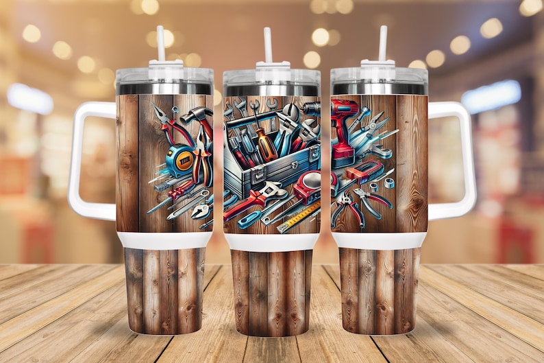 May include: Three stainless steel tumblers with lids and handles. Each tumbler features a different design of tools and a toolbox on a woodgrain background.
