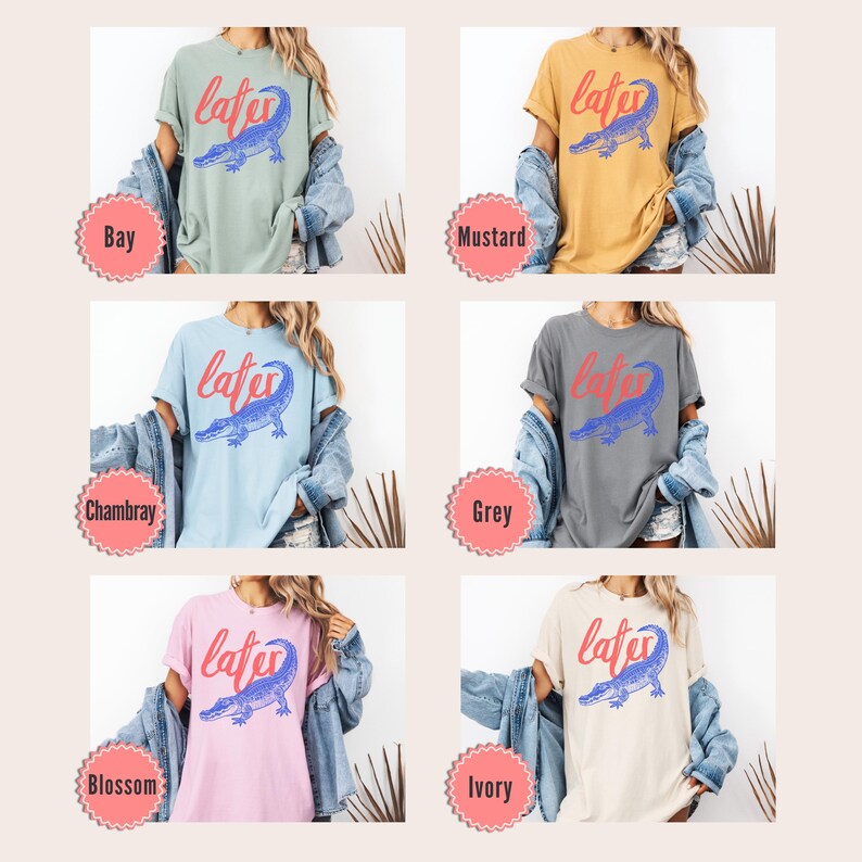 May include: Six different color t-shirts with a graphic of an alligator and the word "later" printed on the front. The colors are bay, mustard, Chambray, grey, blossom, and ivory.