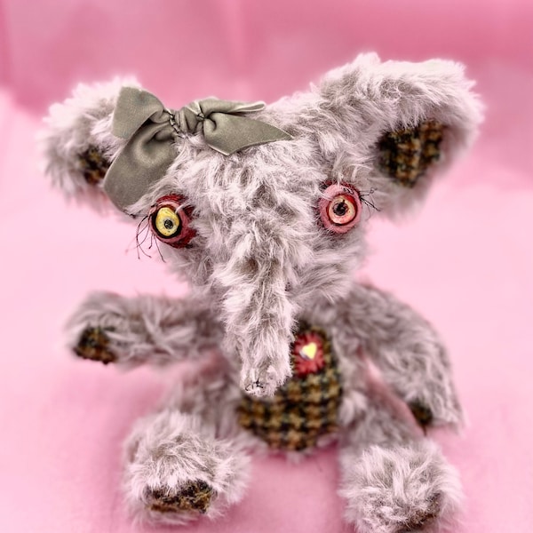 Artist elephant plushie, handmade stuffed animal,fluffy mauve pink crocheted amigurumi plush with plaid accents, ugly creepy cute teddy bear