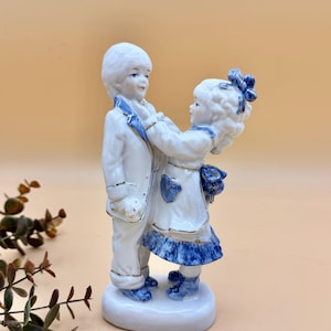 Vintage porcelain Victorian couple, courting sculpture, blue, white and gold, boy and girl couple, wedding decor, cake topper