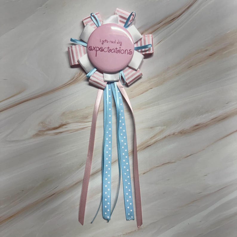 Blue Button Ribbon Unraveled Tour Ribbon Badge Rosette Olivia Inspired Pinback Button ...