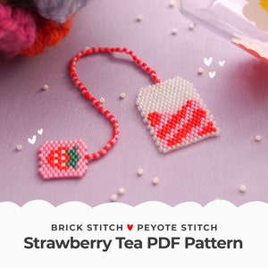 May include: A pink and red beaded strawberry tea bag charm with a white beaded tea bag charm attached to a red and white beaded string. The text "BRICK STITCH ♥ PEYOTE STITCH Strawberry Tea PDF Pattern" is at the bottom of the image.