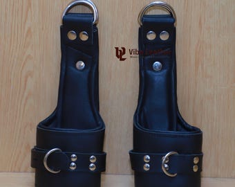 Puños de muñeca acolchados de piel de vacuno con sujeción ajustable, color negro (juego de 2 piezas)