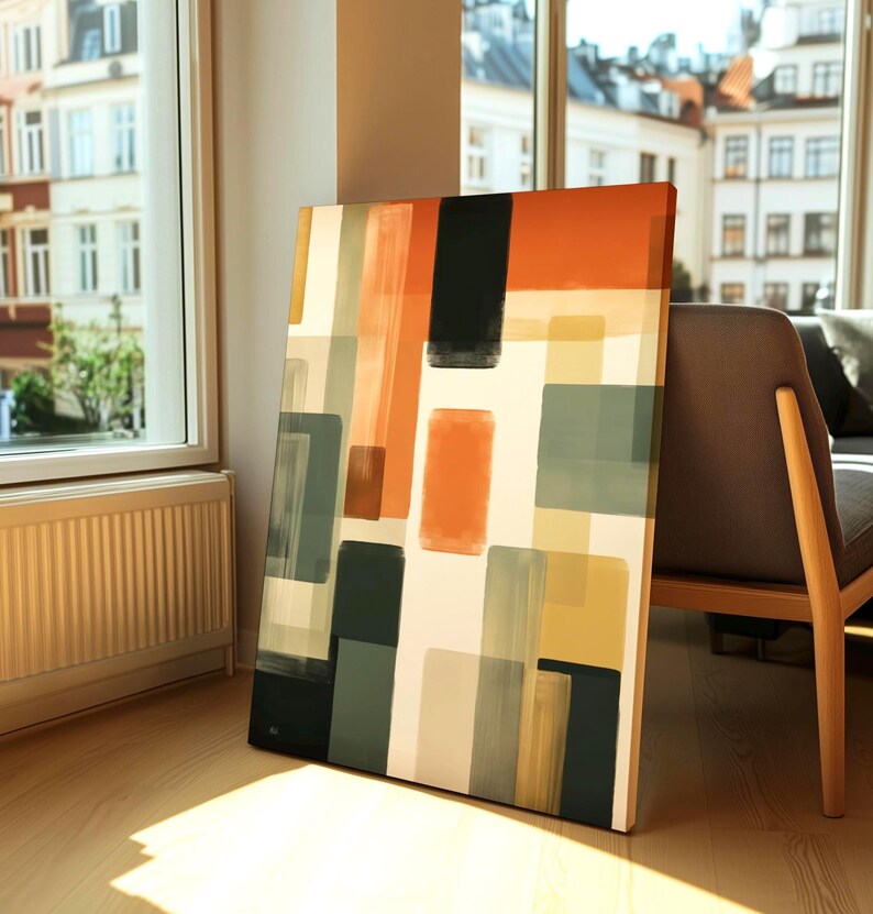 Large Canvas depicting a mid-century modern abstract Artwork is leaning on a wall. Geometrical warm colors. Bauhaus inspired painting.