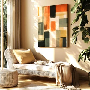 Framed Canvas depicting a mid-century modern abstract Artwork is hanging on a wall. Geometrical warm colors. Bauhaus inspired painting.