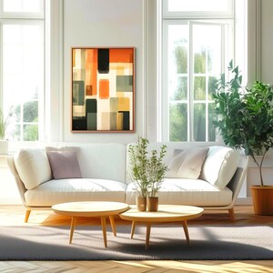Framed Canvas depicting a mid-century modern abstract Artwork is hanging on a wall. Geometrical warm colors. Bauhaus inspired painting.