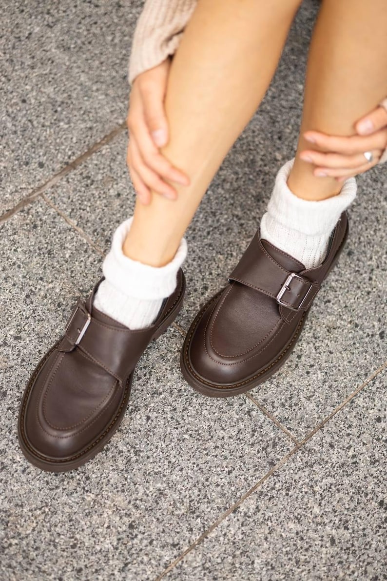 Elegant women’s brown leather flat shoes with small heel