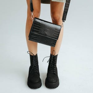 Black nubuck leather boots with fleece or sheepskin lining