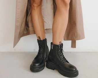 Black leather boots with zipper and laces, durable lightweight sole, fleece or sheepskin lining, handmade shoes