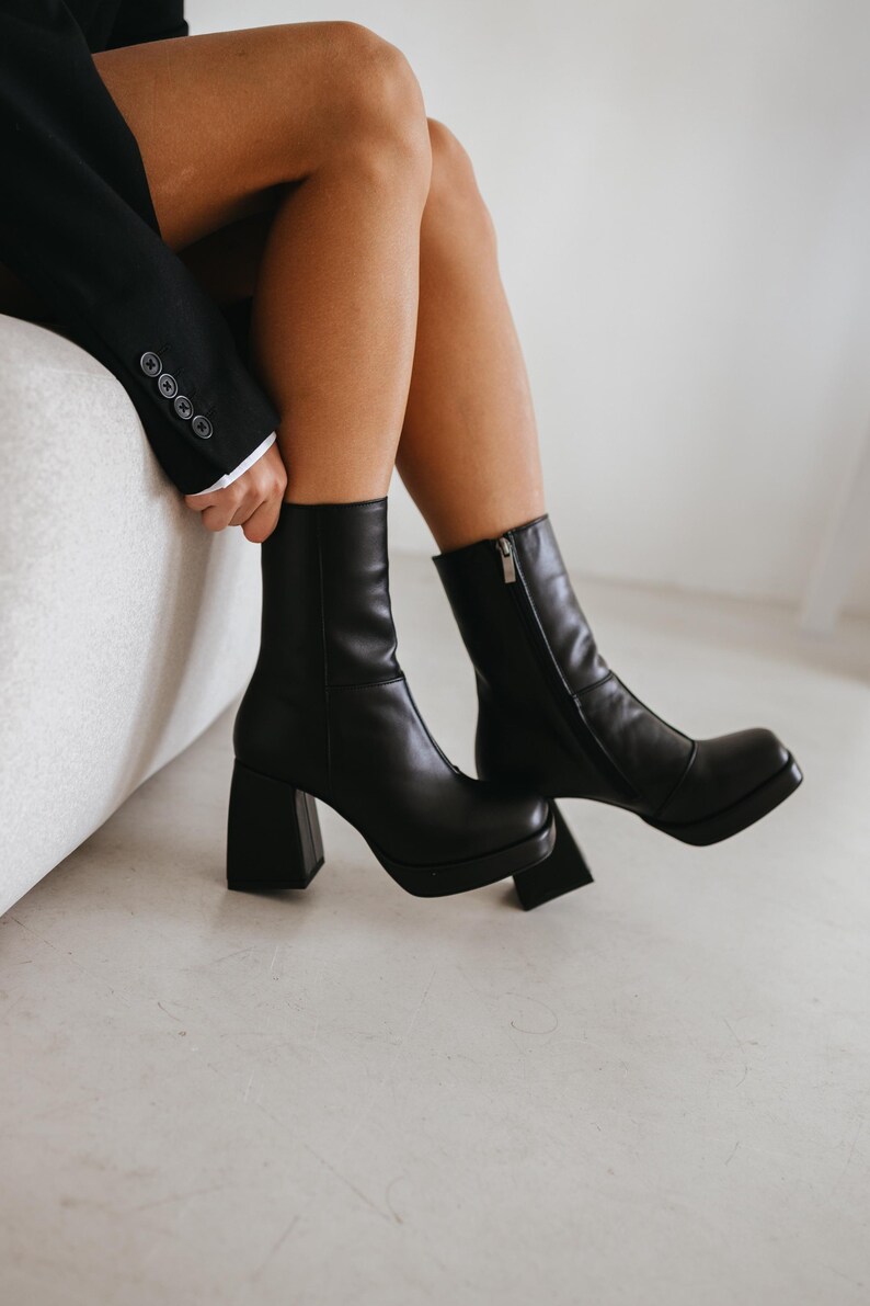Elegant black leather ankle boots with 8.5 cm heel