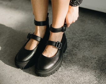 Classic Mary Janes, black summer shoes, open strappy shoes. Chunky loafers with thick soles. City Loafers Mary Janes on the Platform