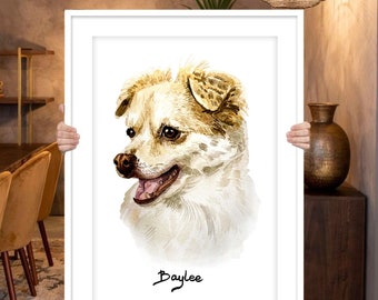 May include: A watercolour painting of a white and brown dog with brown eyes. The dog is looking to the left and has its mouth slightly open. The painting is framed in a white frame and the dog's name, "Baylee", is written in black cursive below the dog.
