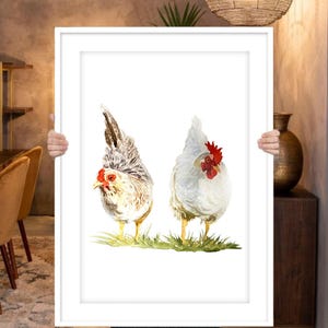 May include: A watercolor painting of two chickens, one white and one gray, standing on a green grassy surface. The chickens are facing different directions, and the white chicken has a red comb.