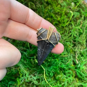 Handwoven shark tooth pendant